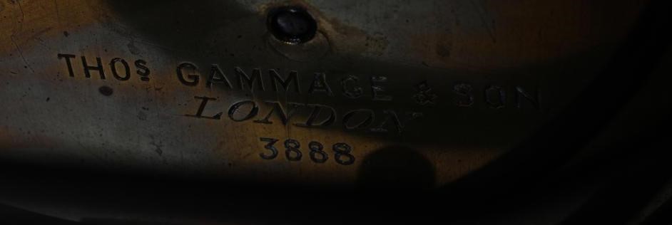 AN OAK CASED TABLE CLOCK by Thomas Gammage & Son Image