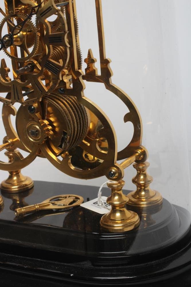 A BRASS SKELETON CLOCK Image