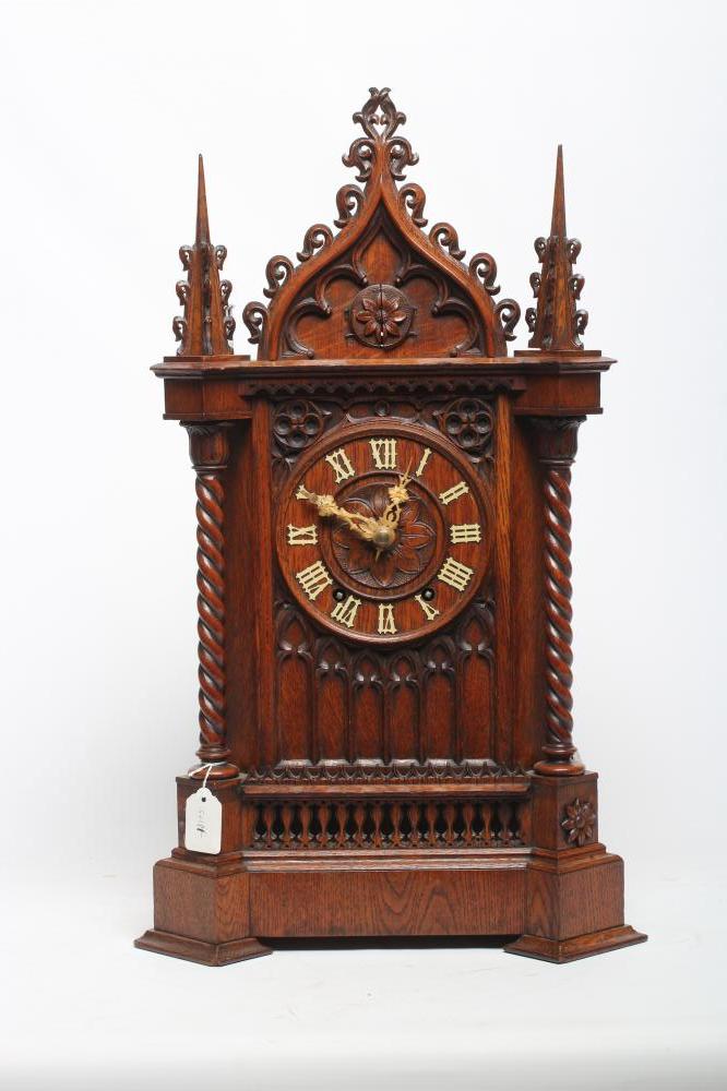 AN OAK CASED CUCKOO TABLE CLOCK Image
