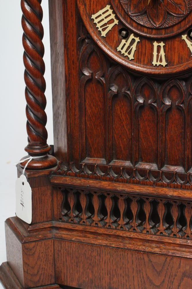 AN OAK CASED CUCKOO TABLE CLOCK Image