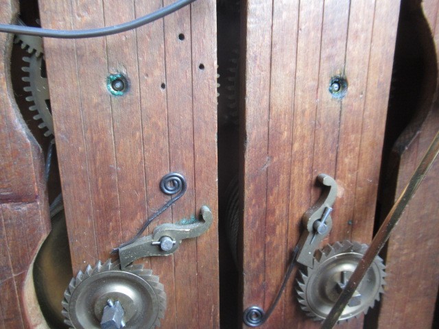 AN OAK CASED CUCKOO TABLE CLOCK Image