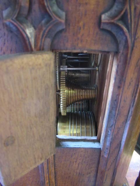 AN OAK CASED CUCKOO TABLE CLOCK Image