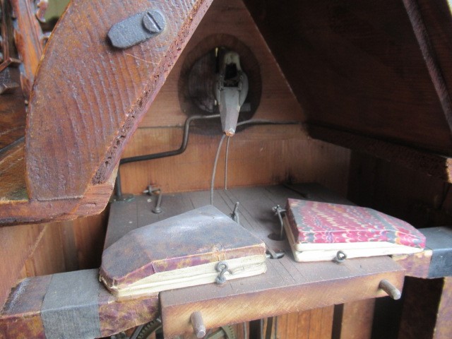 AN OAK CASED CUCKOO TABLE CLOCK Image