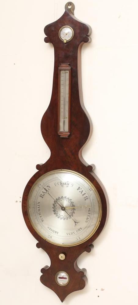 A LARGE MAHOGANY WHEEL BAROMETER Image