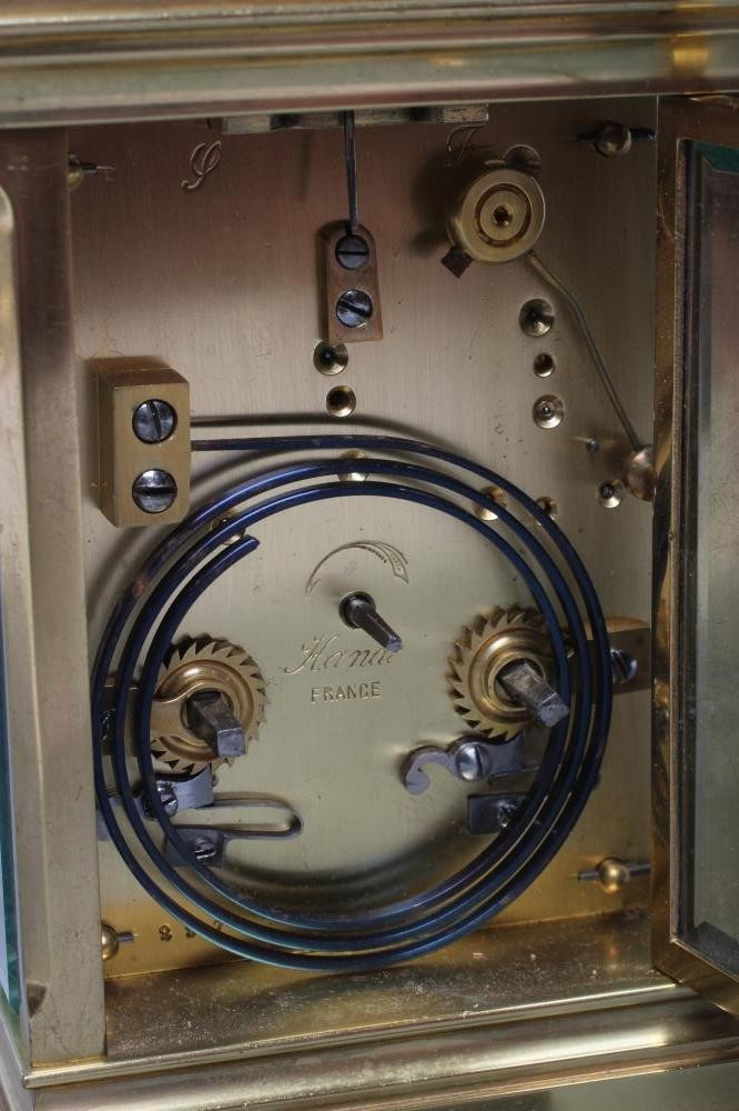 A FRENCH BRASS CASED CARRIAGE CLOCK Image