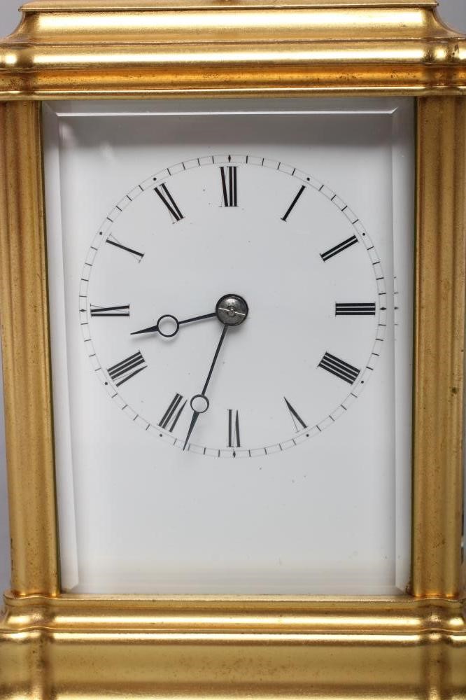 A BRASS CASED CARRIAGE CLOCK Image