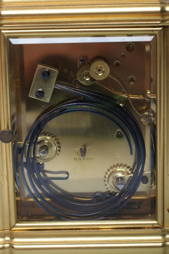 A BRASS CASED CARRIAGE CLOCK Image