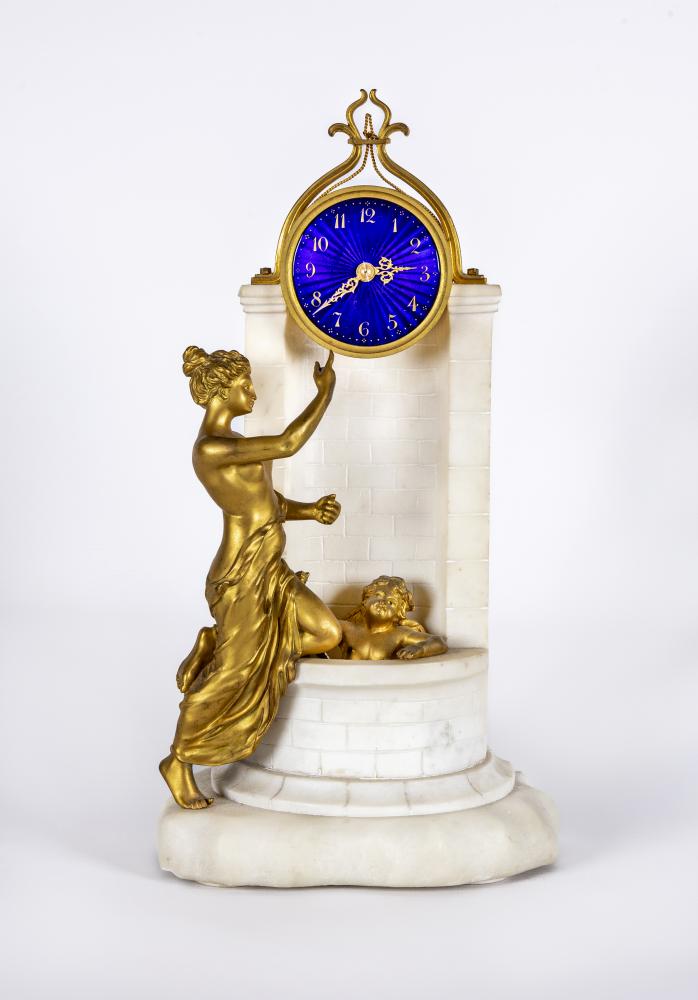 A GILT METAL AND WHITE MARBLE CASED MANTEL CLOCK Image