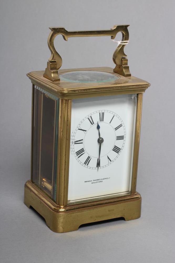 A BRASS CASED CARRIAGE CLOCK Image