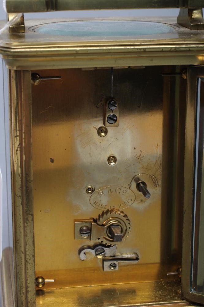 A BRASS CASED CARRIAGE CLOCK Image