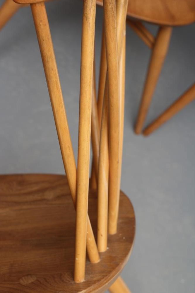 A SET OF FOUR ERCOL MODEL 376 LATTICE BACKED WINDSOR CHAIRS in a light finish with oyster seats Image