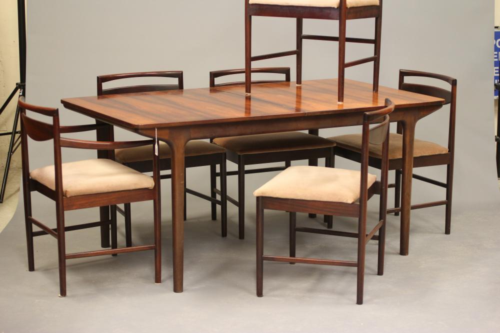 A McINTOSH DINING SUITE designed by Tom Robertson Image