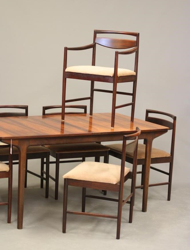 A McINTOSH DINING SUITE designed by Tom Robertson Image