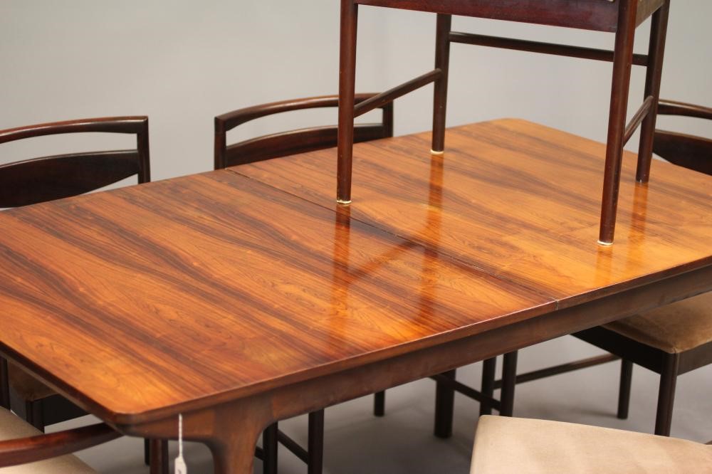 A McINTOSH DINING SUITE designed by Tom Robertson Image