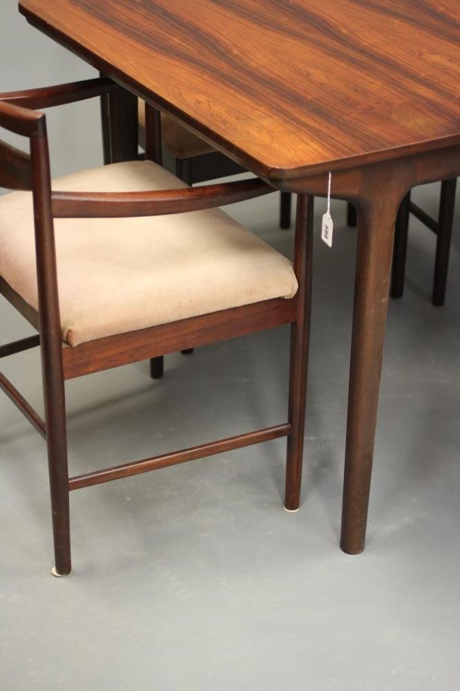 A McINTOSH DINING SUITE designed by Tom Robertson Image