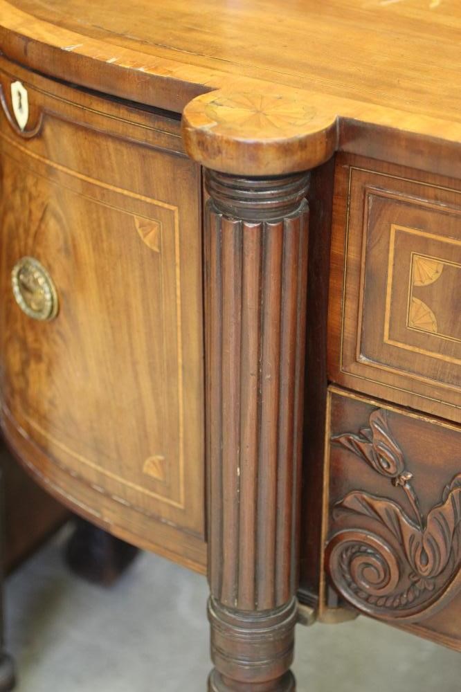 A FINE REGENCY MAHOGANY SIDEBOARD Image