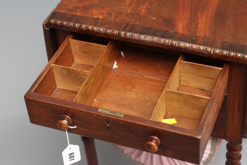 A REGENCY MAHOGANY AND ROSEWOOD BANDED WORK TABLE Image