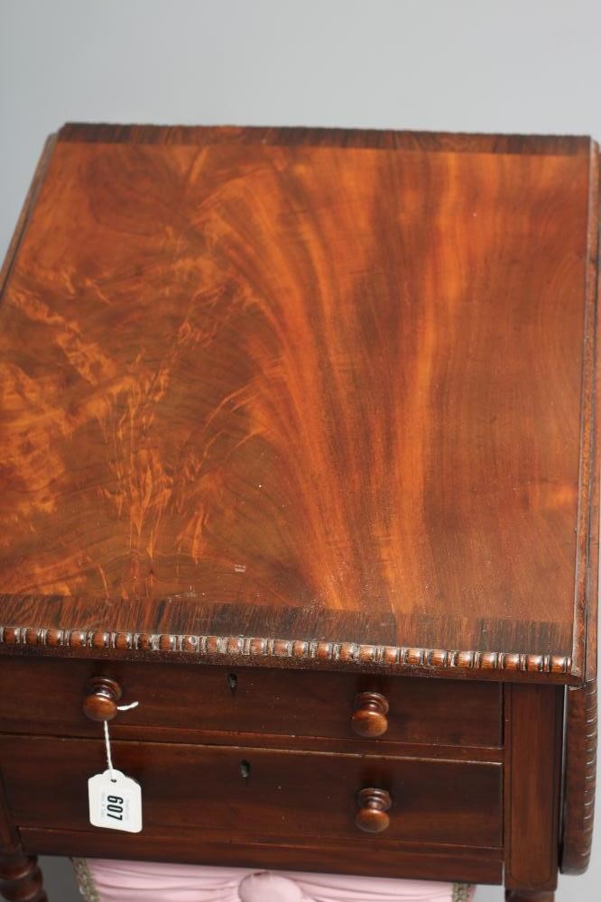 A REGENCY MAHOGANY AND ROSEWOOD BANDED WORK TABLE Image