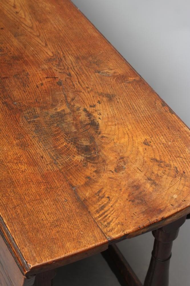 AN OAK DROP LEAF TABLE Image