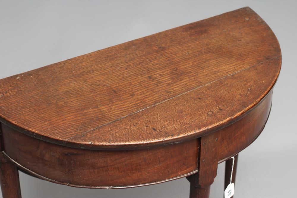 A GEORGIAN OAK DEMI LUNE OCCASIONAL TABLE Image