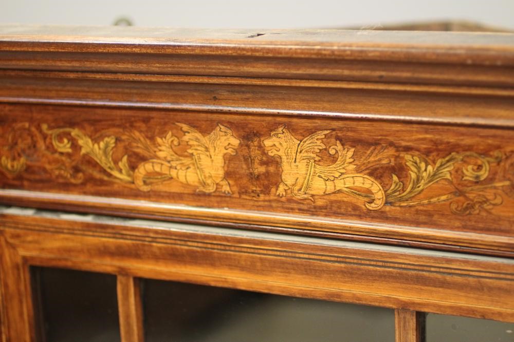 A MAHOGANY CORNER CUPBOARD Image