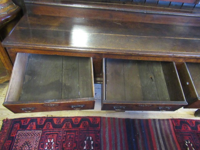 A GEORGIAN OAK LOW DRESSER Image