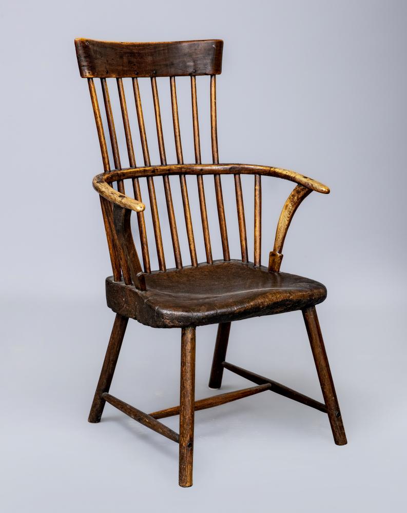 AN ASH COMB BACK WINDSOR ARMCHAIR Image