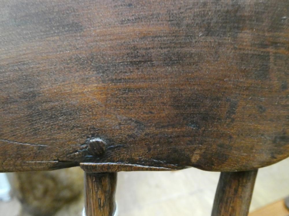 AN ASH COMB BACK WINDSOR ARMCHAIR Image