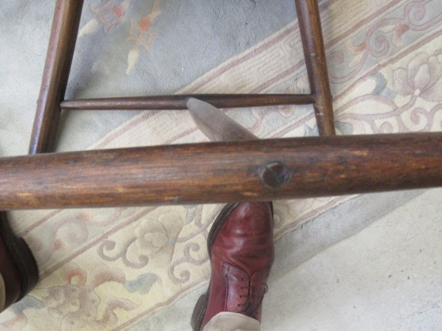 AN ASH COMB BACK WINDSOR ARMCHAIR Image