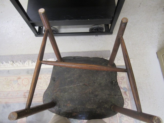 AN ASH COMB BACK WINDSOR ARMCHAIR Image