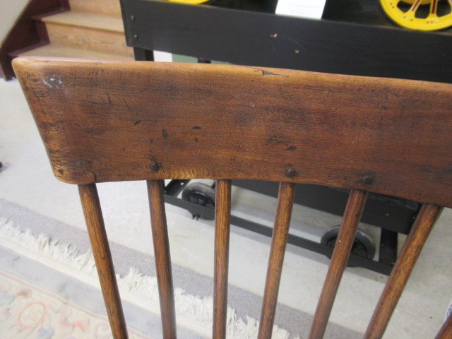 AN ASH COMB BACK WINDSOR ARMCHAIR Image