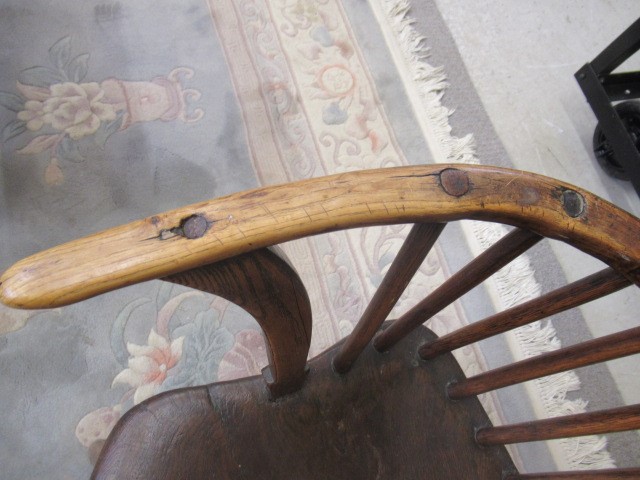 AN ASH COMB BACK WINDSOR ARMCHAIR Image