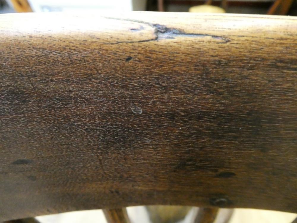 AN ASH COMB BACK WINDSOR ARMCHAIR Image