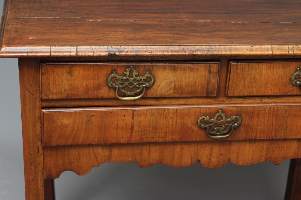 A GEORGIAN OAK AND WALNUT VENEERED LOW BOY Image