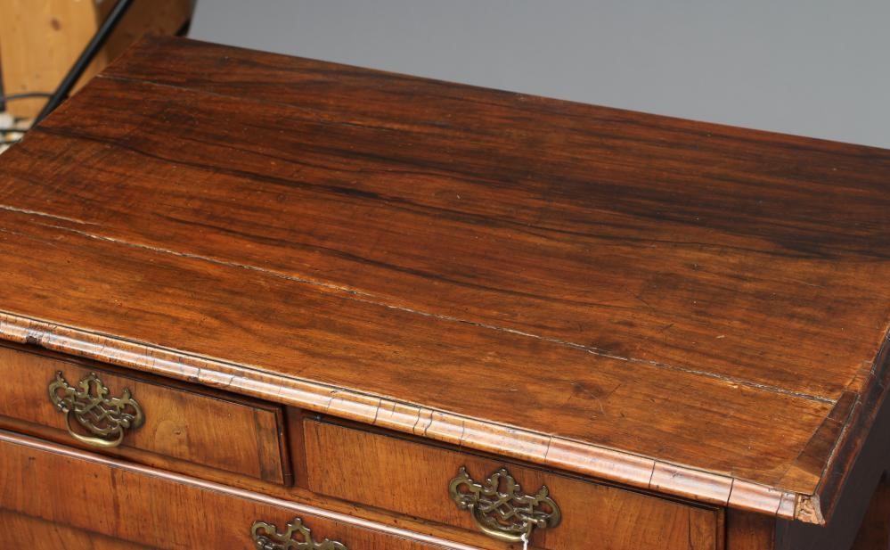A GEORGIAN OAK AND WALNUT VENEERED LOW BOY Image
