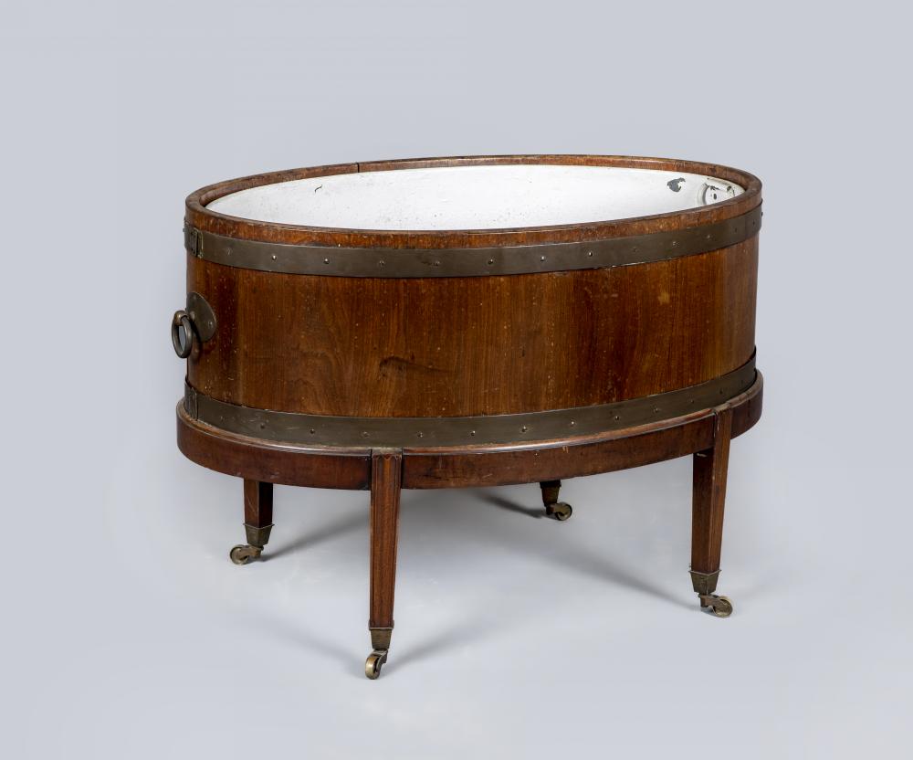 A GEORGIAN MAHOGANY AND BRASS BOUND WINE COOLER Image