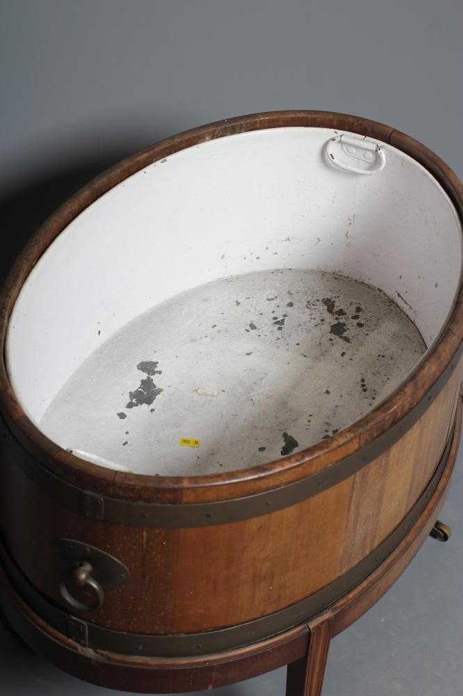 A GEORGIAN MAHOGANY AND BRASS BOUND WINE COOLER Image