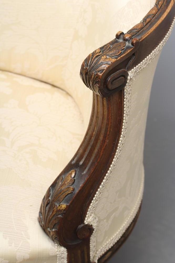A MAHOGANY AND PARCEL GILT TUB CHAIR in Louis XV style Image