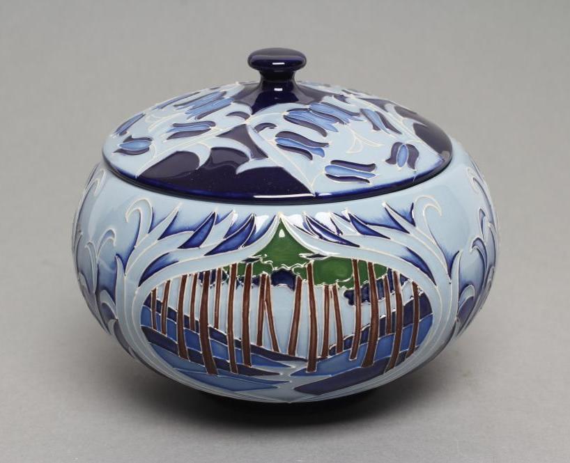 A MOORCROFT POTTERY "ASHGROVE" PATTERN VASE AND COVER Image