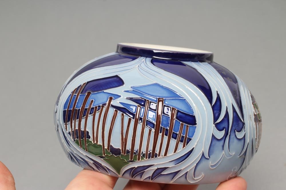 A MOORCROFT POTTERY "ASHGROVE" PATTERN VASE AND COVER Image