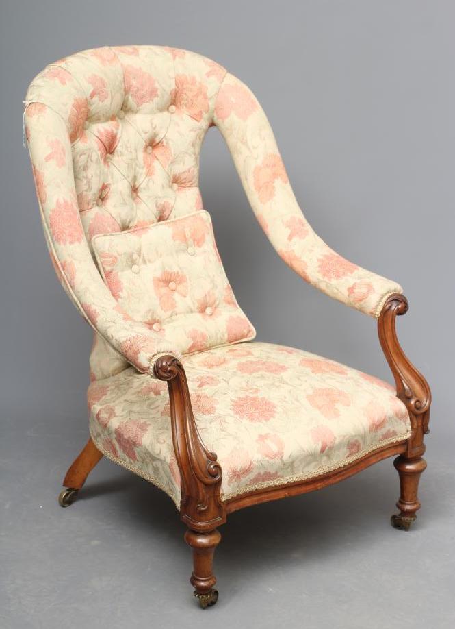 A VICTORIAN WALNUT SALON CHAIR button upholstered in a pale cream and salmon weave Image