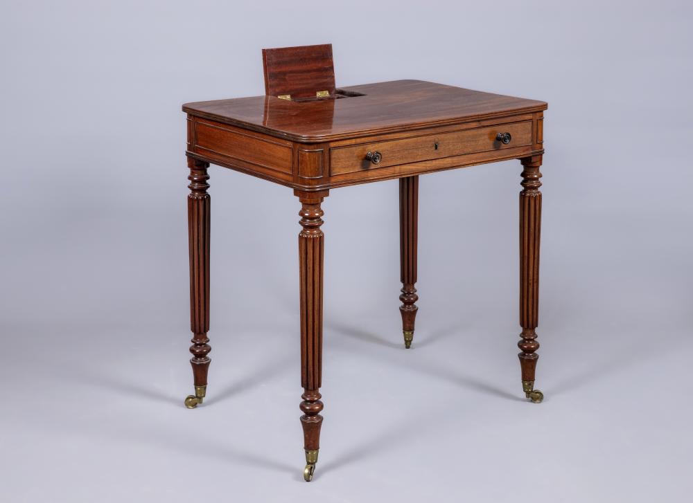 A REGENCY MAHOGANY CHAMBER WRITING TABLE ATTRIBUTED TO GILLOWS Image