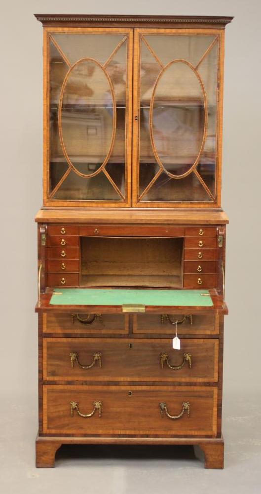 A SMALL GEORGIAN MAHOGANY SECRETAIRE BOOKCASE Image