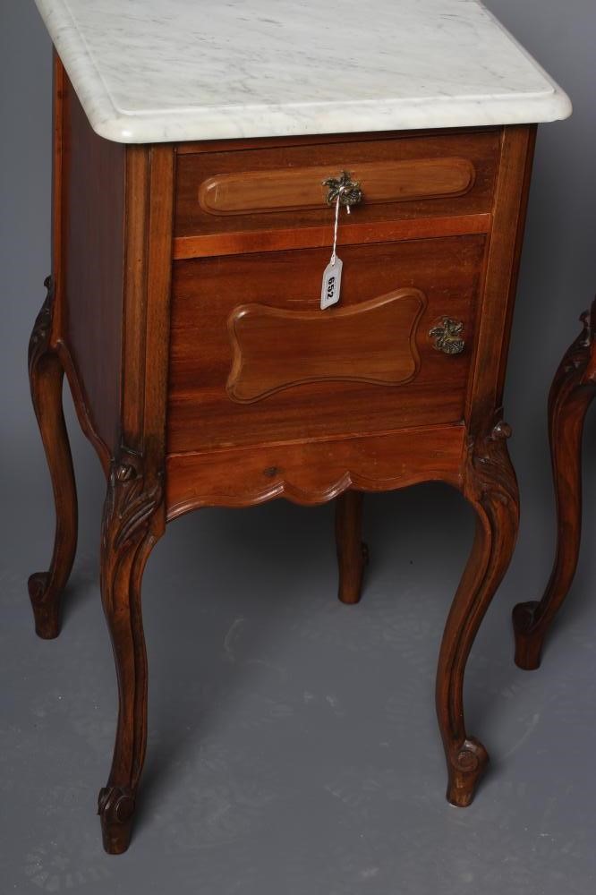 A PAIR OF FRENCH WALNUT BEDSIDE CABINETS Image