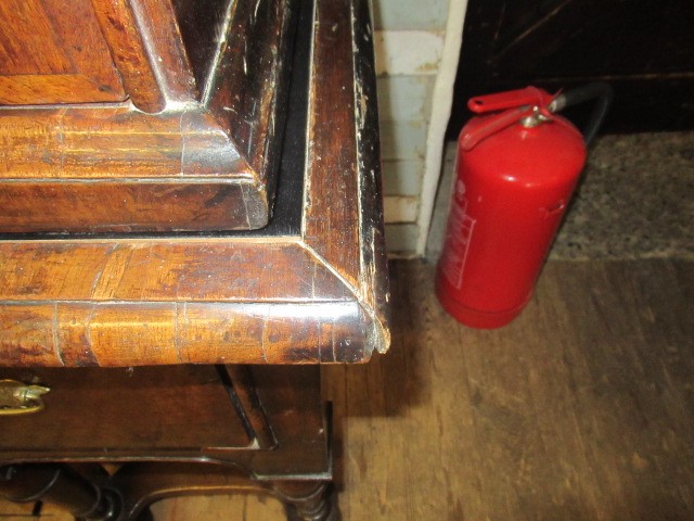 A GEORGIAN WALNUT AND BANDED CHEST ON STAND Image