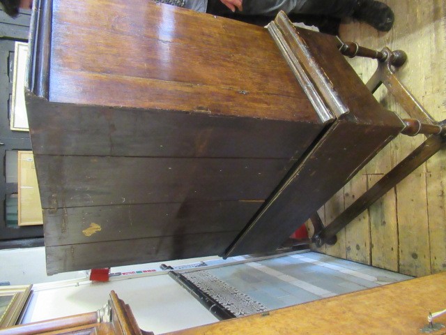 A GEORGIAN WALNUT AND BANDED CHEST ON STAND Image