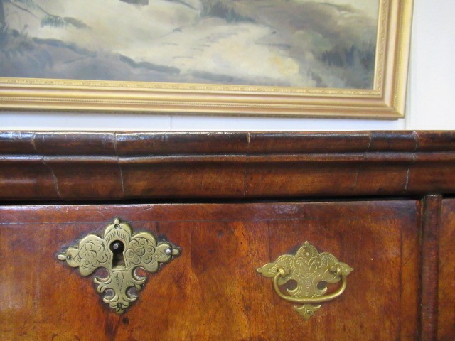 A GEORGIAN WALNUT AND BANDED CHEST ON STAND Image