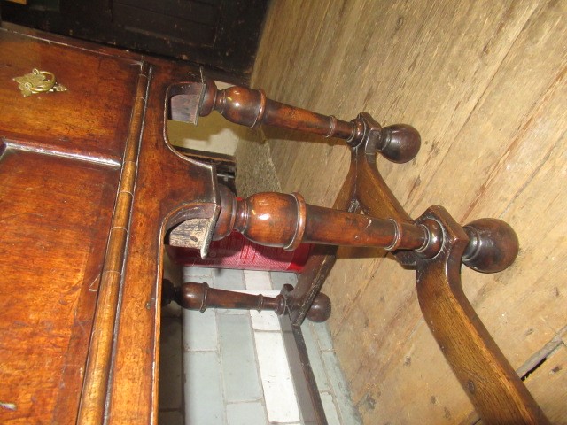 A GEORGIAN WALNUT AND BANDED CHEST ON STAND Image