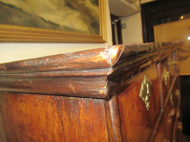 A GEORGIAN WALNUT AND BANDED CHEST ON STAND Image