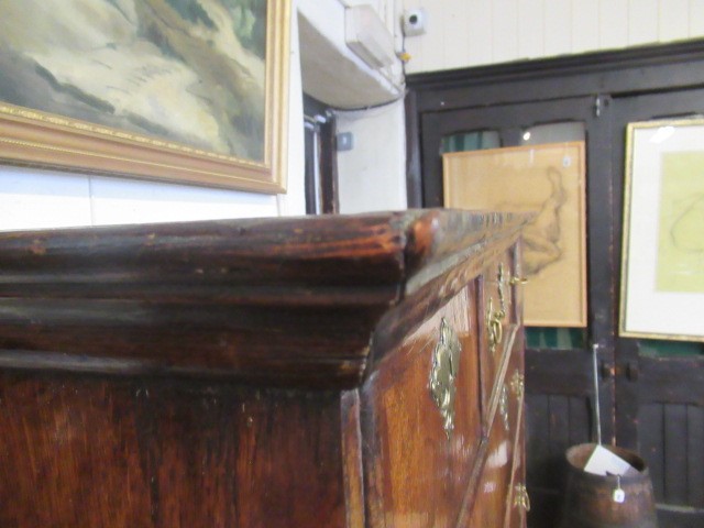 A GEORGIAN WALNUT AND BANDED CHEST ON STAND Image
